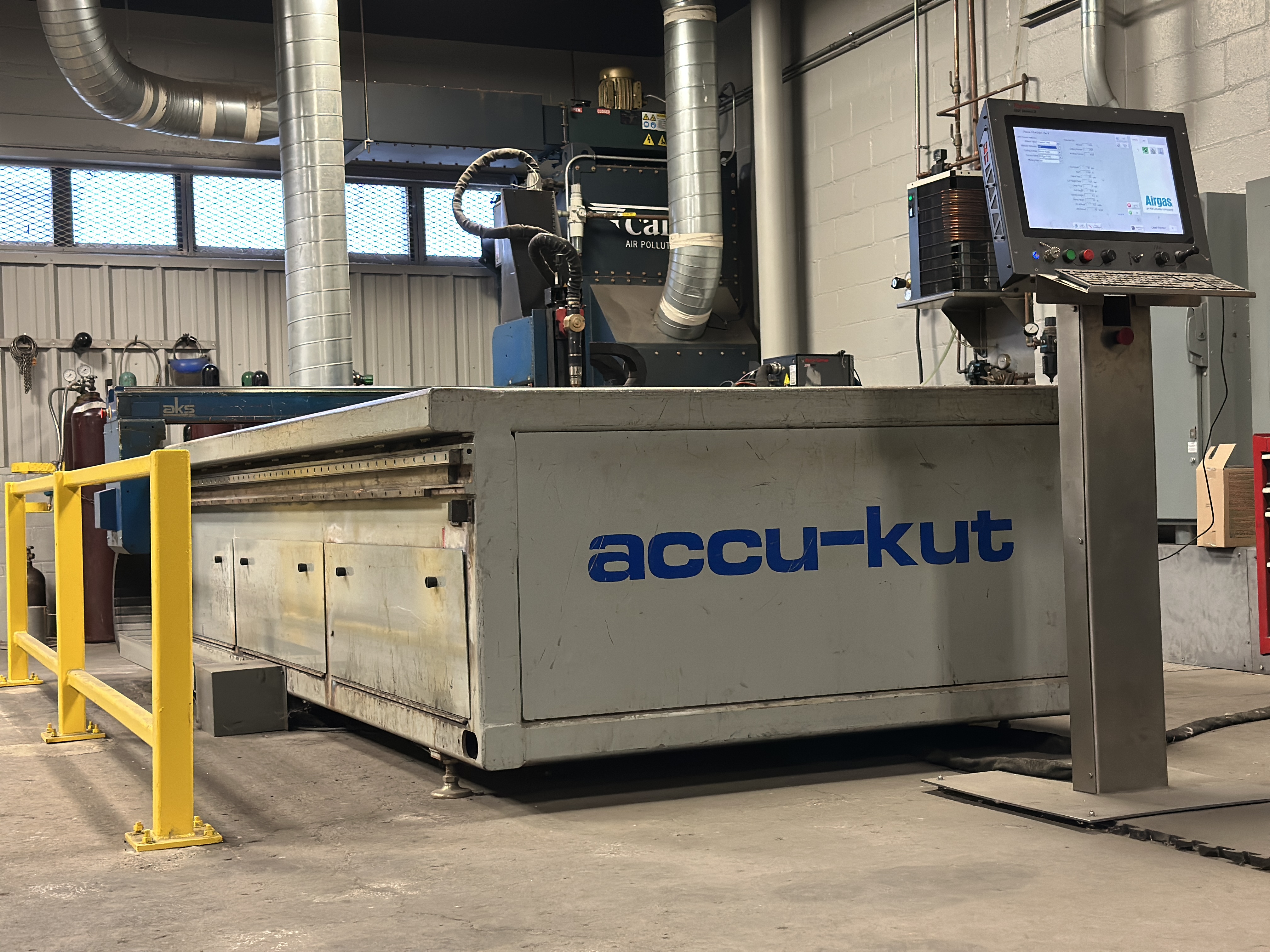 09 AKS Accu Kut table and control pedestal